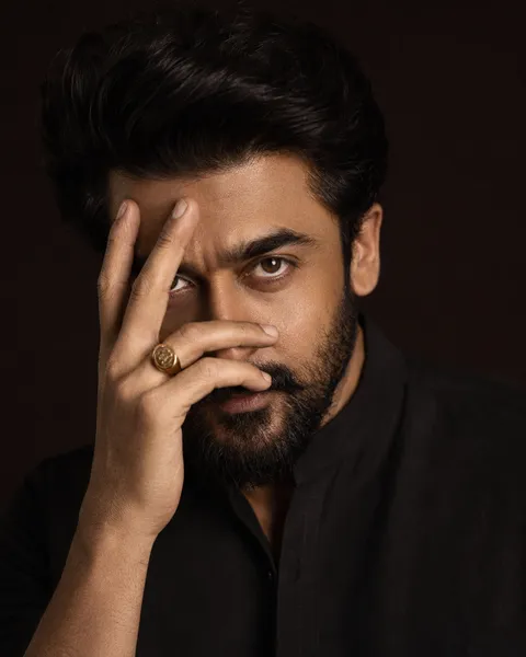 Intense Gaze with Hand Resting